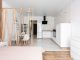 Interieur d'un studio etudiant moderne et lumineux avec cuisine ouverte, illustrant le cadre du bail etudiant 9 mois.